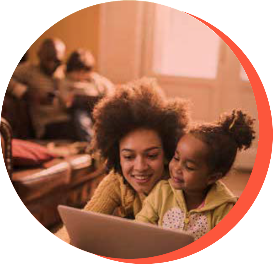 family engaging at computer